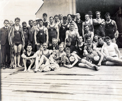 A group of competitors in various swimming, diving, and rowing events at the 1904 Olympics.