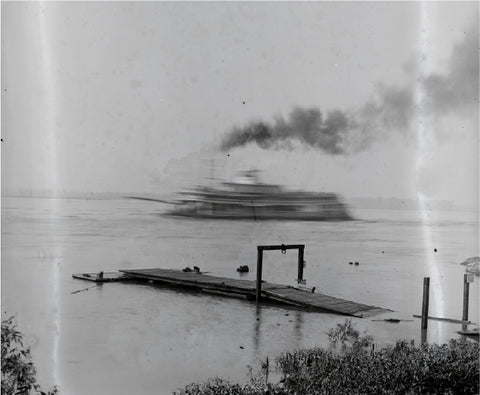 Century Boat Club’s pier on the Mississippi river, where rowing practice was held rightalongside the ferries and steamboats.At the peak of its popularity in St. Louis(between 1880 and 1941), there were nine rowing clubs located along the banks ofthe Mississippi River.